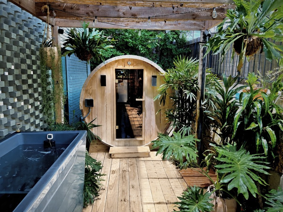 The Garden at Cøntrast — a traditional barrel sauna and cold plunge in an East Austin courtyard